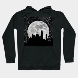 Silhouette of a city against a giant moon Hoodie